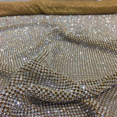 working with rhinestone metal mesh fabric|stretchable rhinestone fabric.